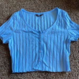 I am selling a baby blue crop top